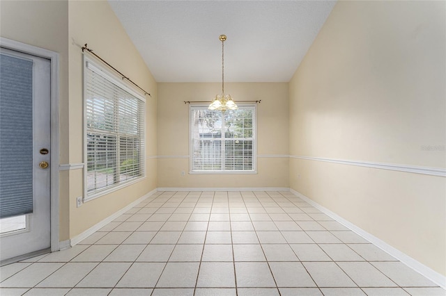 8036 SW 72nd Pl, Gainesville, FL 32608 - unfurnished dining area with lofted ceiling and a chandelier