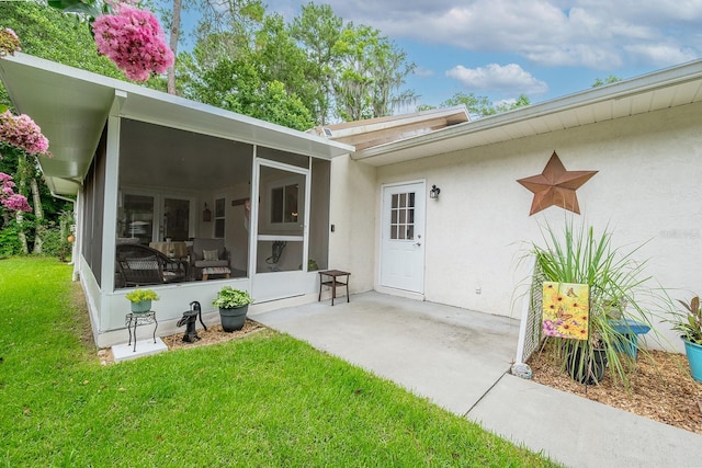 8488 NW 39th Ter, Gainesville, FL 32653 - entrance to property with a lawn and stucco siding