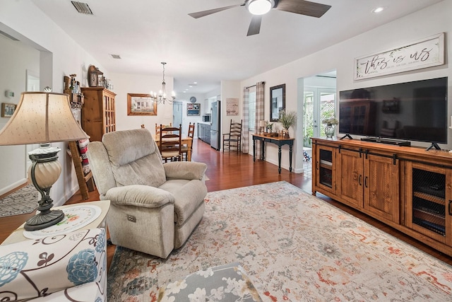 8488 NW 39th Ter, Gainesville, FL 32653 - living area with wood finished floors, a chandelier, a ceiling fan, and recessed lighting
