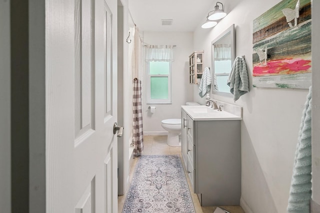 8488 NW 39th Ter, Gainesville, FL 32653 - bathroom featuring vanity, a shower with shower curtain, and tile patterned floors