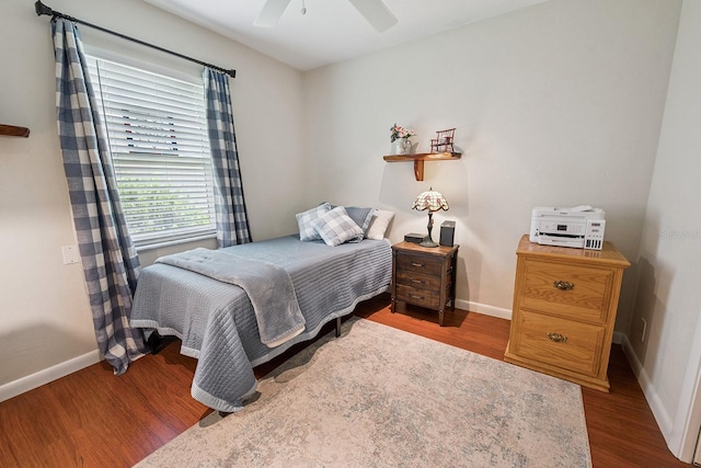 8488 NW 39th Ter, Gainesville, FL 32653 - bedroom with wood finished floors and ceiling fan