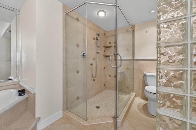 4555 S Atlantic Ave Unit 4603, Ponce Inlet, FL 32127 - bathroom with tile patterned flooring, a shower stall, and a bath