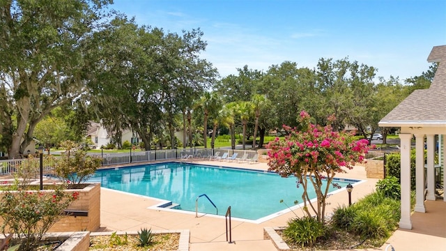 10549 NW 32nd Rd, Gainesville, FL 32606 - community pool featuring a patio