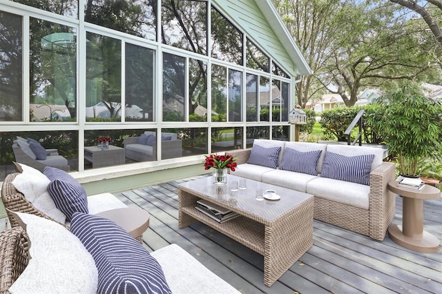 10549 NW 32nd Rd, Gainesville, FL 32606 - deck with an outdoor living space and a sunroom