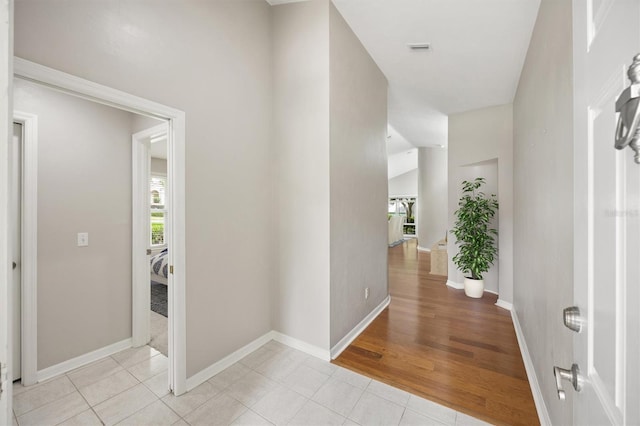 10549 NW 32nd Rd, Gainesville, FL 32606 - foyer entrance featuring light tile patterned flooring and baseboards