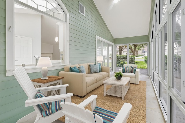 10549 NW 32nd Rd, Gainesville, FL 32606 - sunroom with wood walls, high vaulted ceiling, and tile patterned flooring