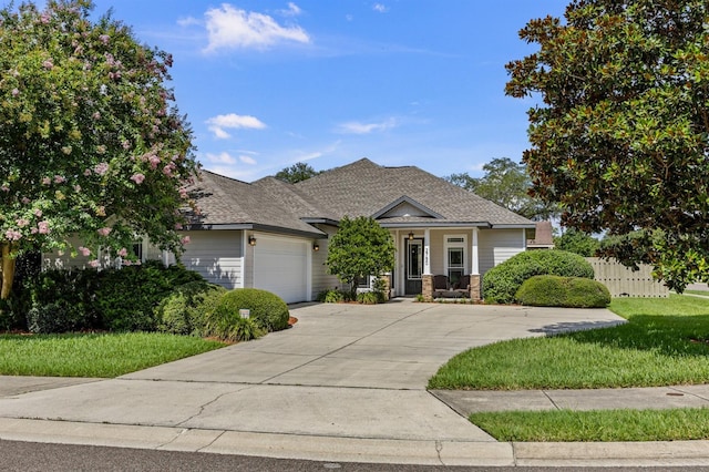 2750 NW 143rd Way, Newberry, FL 32669 - view of front of house with a garage, driveway, and roof with shingles