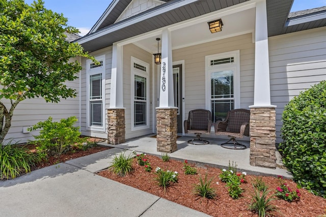 2750 NW 143rd Way, Newberry, FL 32669 - property entrance with covered porch and stone siding