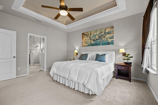 2750 NW 143rd Way, Newberry, FL 32669 - bedroom with a raised ceiling, light colored carpet, ornamental molding, ensuite bath, and ceiling fan