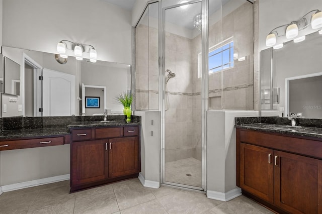 2750 NW 143rd Way, Newberry, FL 32669 - bathroom with a shower stall, two vanities, and tile patterned flooring