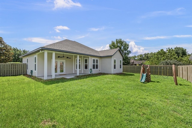 2750 NW 143rd Way, Newberry, FL 32669 - rear view of house featuring a ceiling fan, a fenced backyard, and french doors