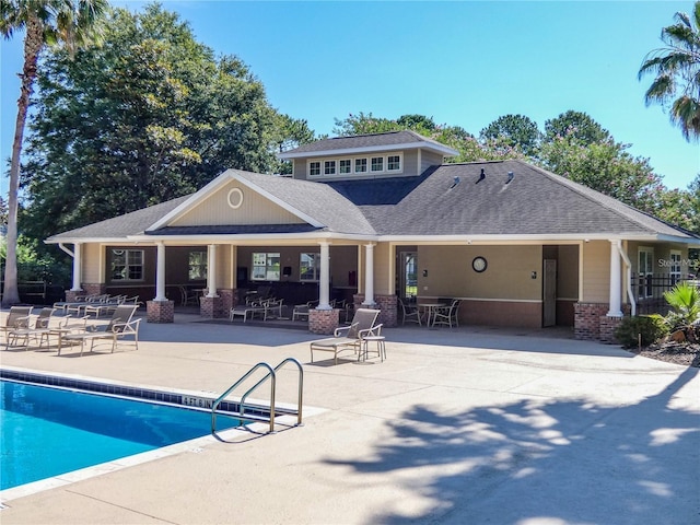2750 NW 143rd Way, Newberry, FL 32669 - community pool featuring a patio area