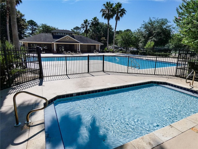 2750 NW 143rd Way, Newberry, FL 32669 - community pool featuring a patio