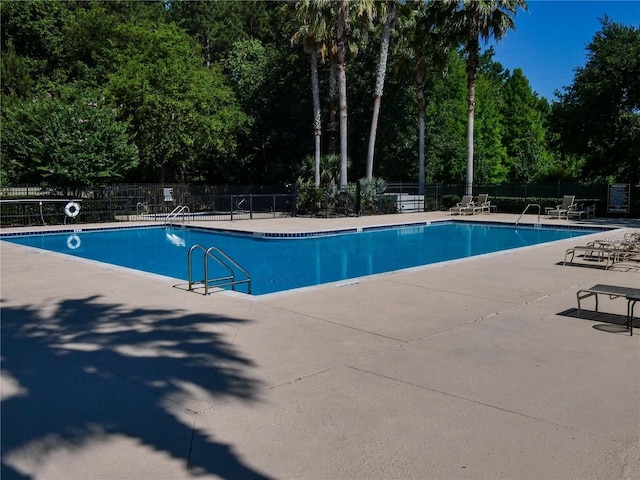 2750 NW 143rd Way, Newberry, FL 32669 - community pool with a patio