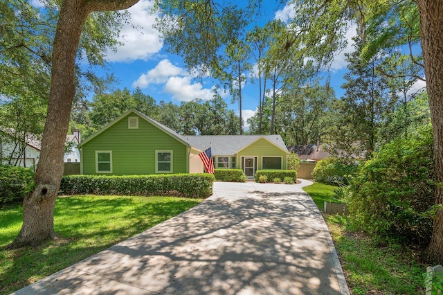 4705 SW 80th Ter, Gainesville, FL 32608 - view of front of house with driveway and a front yard