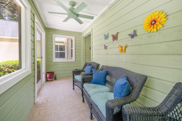 4705 SW 80th Ter, Gainesville, FL 32608 - sunroom / solarium featuring ceiling fan and plenty of natural light