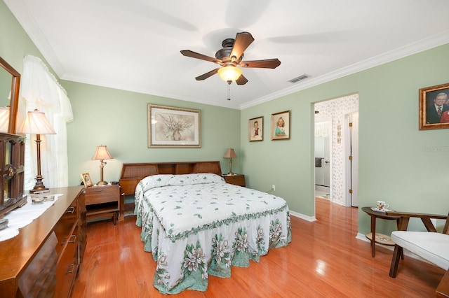4705 SW 80th Ter, Gainesville, FL 32608 - bedroom featuring ornamental molding and wood finished floors