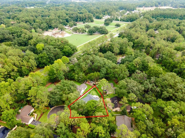 4705 SW 80th Ter, Gainesville, FL 32608 - aerial view of property's location featuring property parcel outlined and a heavily wooded area