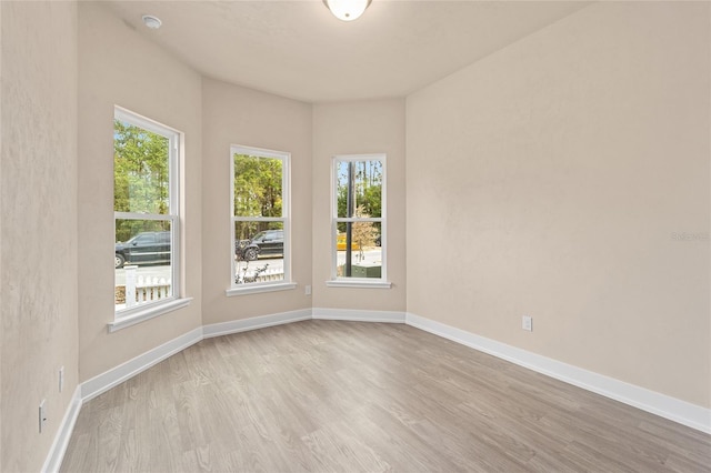 1080 NW 132nd Blvd, Newberry, FL 32669 - spare room with wood finished floors and baseboards
