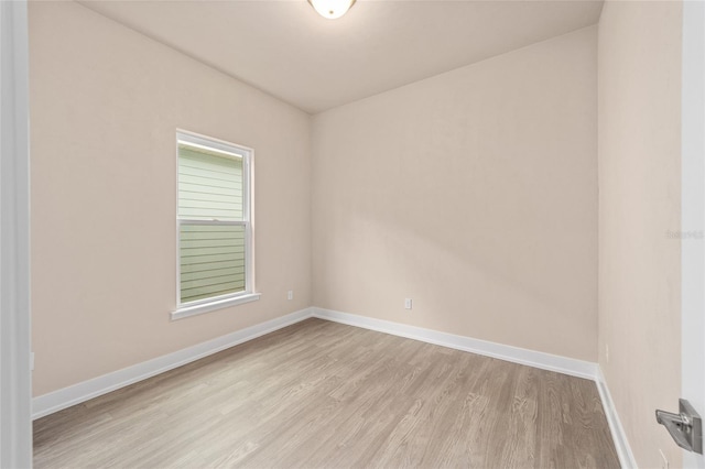 1080 NW 132nd Blvd, Newberry, FL 32669 - unfurnished room with light wood-type flooring and baseboards