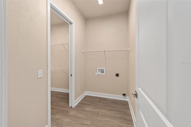1080 NW 132nd Blvd, Newberry, FL 32669 - laundry area with washer hookup, wood finished floors, and electric dryer hookup