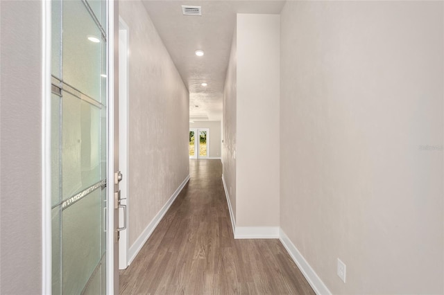 1080 NW 132nd Blvd, Newberry, FL 32669 - hallway with wood finished floors and recessed lighting