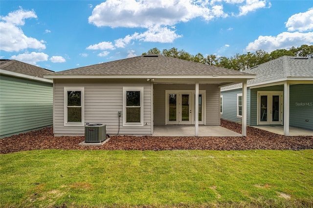 1080 NW 132nd Blvd, Newberry, FL 32669 - rear view of house with french doors, a yard, and a patio
