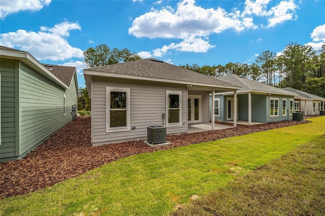 1080 NW 132nd Blvd, Newberry, FL 32669 - back of property featuring a yard, a patio, french doors, and a shingled roof