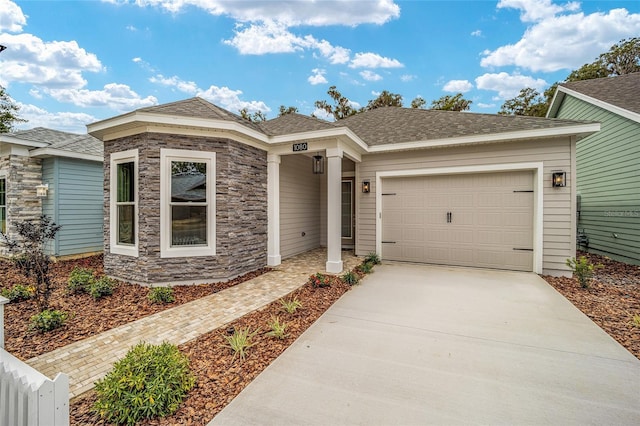 1080 NW 132nd Blvd, Newberry, FL 32669 - view of front facade featuring a garage, driveway, roof with shingles, and stone siding