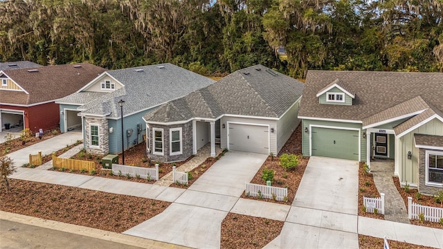 1080 NW 132nd Blvd, Newberry, FL 32669 - craftsman house with driveway, a garage, and roof with shingles