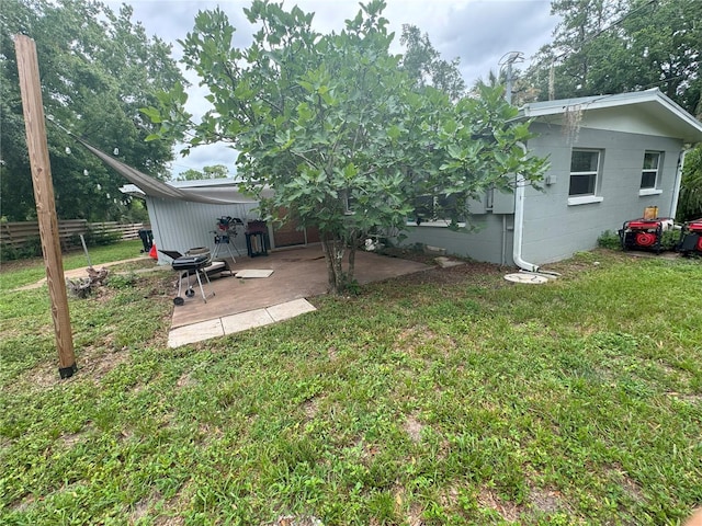 1215 NE 21st Ave, Gainesville, FL 32609 - view of yard featuring a patio
