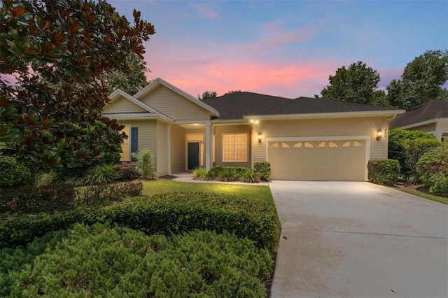 8650 SW 26th Ln, Gainesville, FL 32608 - ranch-style home with driveway and a garage