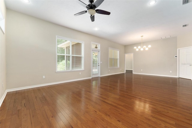 8650 SW 26th Ln, Gainesville, FL 32608 - unfurnished living room with a chandelier, ceiling fan, wood finished floors, and recessed lighting