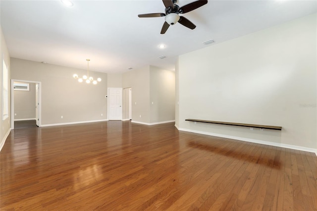 8650 SW 26th Ln, Gainesville, FL 32608 - unfurnished living room featuring a chandelier, wood finished floors, and ceiling fan
