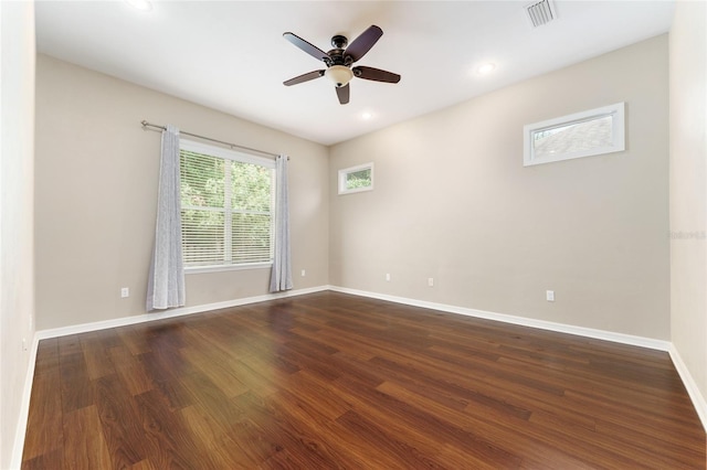 8650 SW 26th Ln, Gainesville, FL 32608 - spare room with a ceiling fan, dark wood finished floors, and recessed lighting
