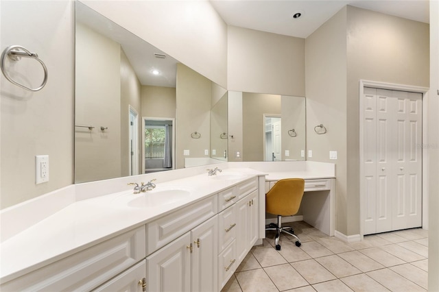 8650 SW 26th Ln, Gainesville, FL 32608 - bathroom featuring double vanity and tile patterned floors