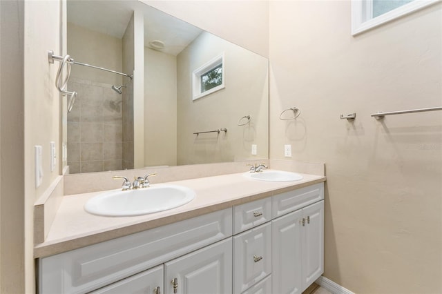 8650 SW 26th Ln, Gainesville, FL 32608 - full bath featuring double vanity and a tile shower