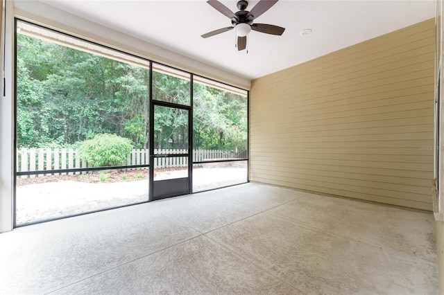8650 SW 26th Ln, Gainesville, FL 32608 - spare room with ceiling fan and concrete floors