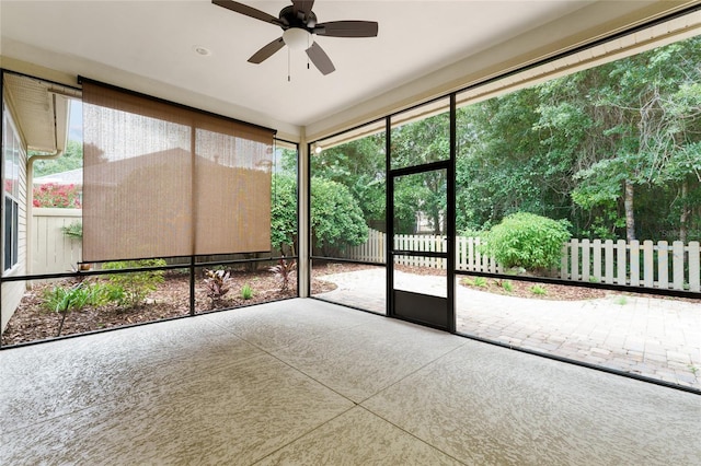 8650 SW 26th Ln, Gainesville, FL 32608 - unfurnished sunroom featuring a ceiling fan
