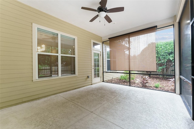 8650 SW 26th Ln, Gainesville, FL 32608 - unfurnished sunroom featuring a ceiling fan and plenty of natural light