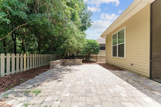 8650 SW 26th Ln, Gainesville, FL 32608 - fenced backyard featuring a patio area