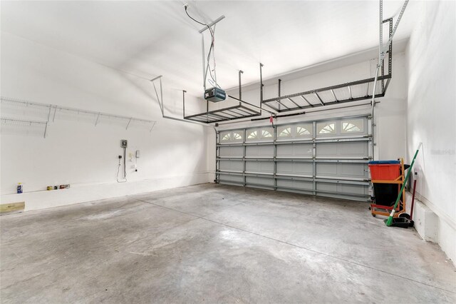 8650 SW 26th Ln, Gainesville, FL 32608 - garage featuring a garage door opener