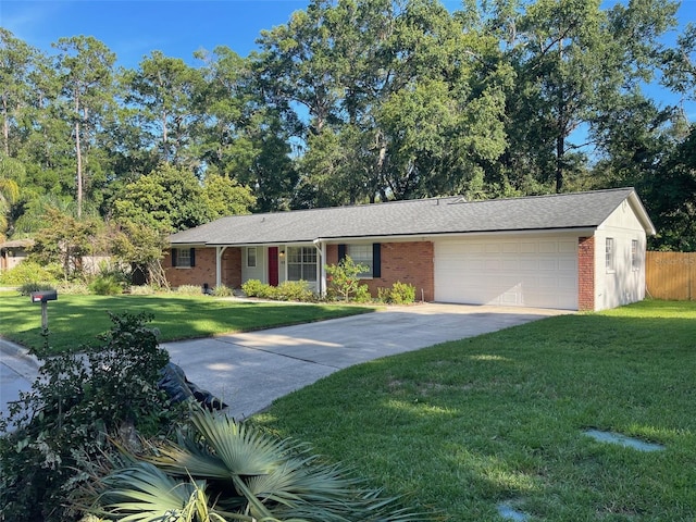 4121 NW 15th Pl, Gainesville, FL 32605 - ranch-style house with an attached garage, brick siding, and concrete driveway
