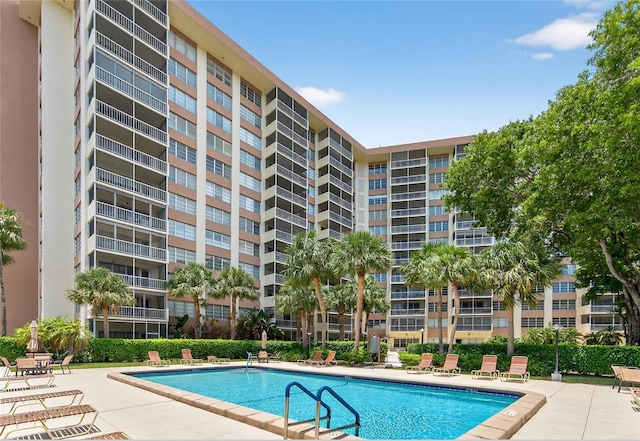 10777 W Sample Rd Unit 1212, Coral Springs, FL 33065 - community pool with a patio