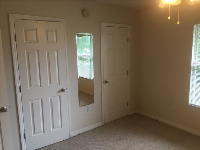 2375 SW 42nd Way Unit 160, Gainesville, FL 32607 - unfurnished bedroom with light carpet and baseboards