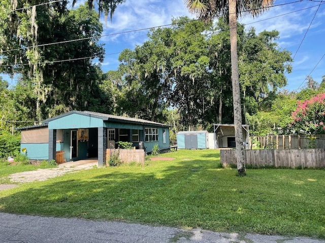 430 SE 74th St, Gainesville, FL 32641 - view of front of house featuring a shed