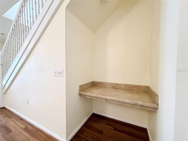 4877 NW 42nd Rd Unit 106, Gainesville, FL 32606 - mudroom featuring dark wood-type flooring and baseboards
