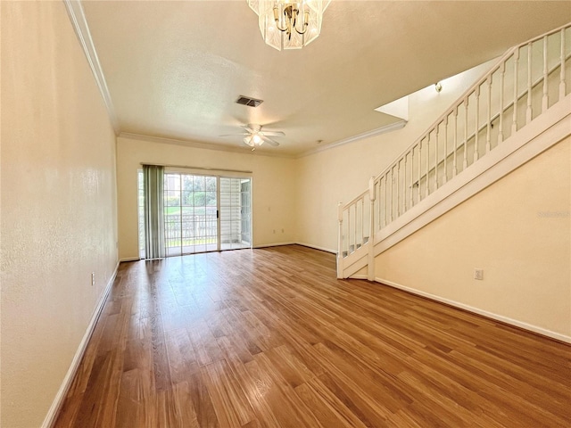 4877 NW 42nd Rd Unit 106, Gainesville, FL 32606 - unfurnished living room featuring ornamental molding, stairs, wood finished floors, a chandelier, and ceiling fan