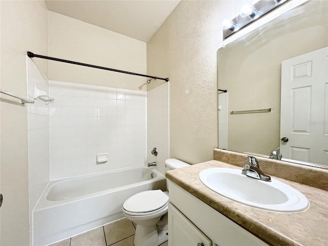 4877 NW 42nd Rd Unit 106, Gainesville, FL 32606 - full bath with a textured wall, vanity, shower / bathtub combination, and tile patterned flooring
