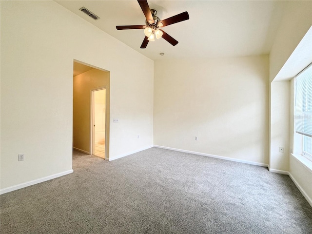 4877 NW 42nd Rd Unit 106, Gainesville, FL 32606 - spare room featuring carpet flooring, ceiling fan, and vaulted ceiling